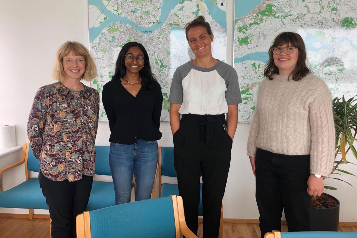 Photo of Neha Allathur standing with three other women