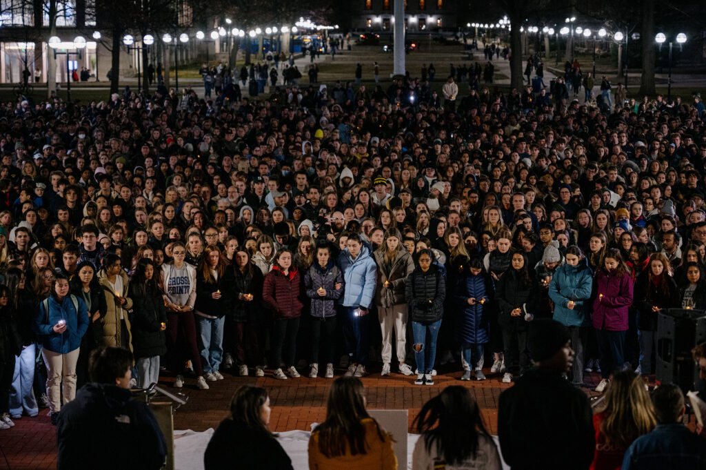 The University of Michigan community gathers for a vigil to mourn the Michigan State University students who were killed and injured during a mass shooting earlier this week on Wednesday, Feb. 15, 2023.