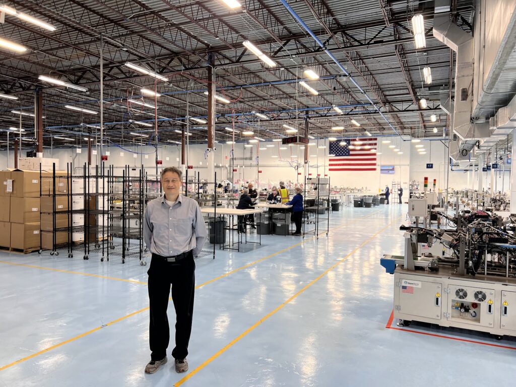 Albert Shih, who leads the N95 project at U-M, visits the N95 and mask production factory floor of the industry lead DemeTECH. Image courtesy: Albert Shih.