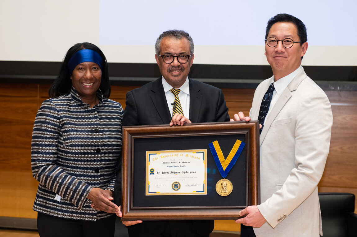 Regent Katherine White and President Santa J. One present Tedros Adhanom Ghebreyesus with the Thomas Francis Jr. Medal in Global Public Health.
