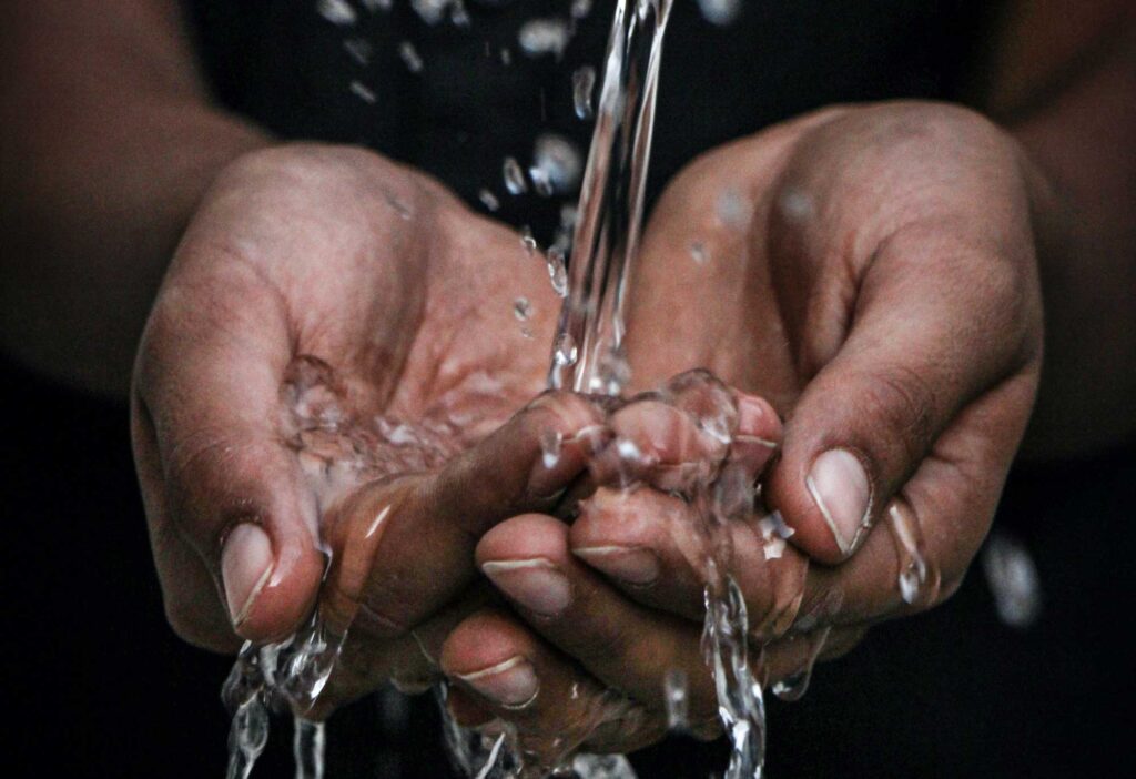 Hands under running tap water. Image credit: mrjn Photography, Unsplash.com