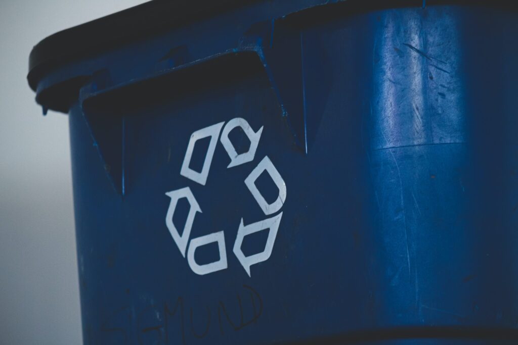 Blue recycling bin. Image credit: Sigmund, Unsplash
