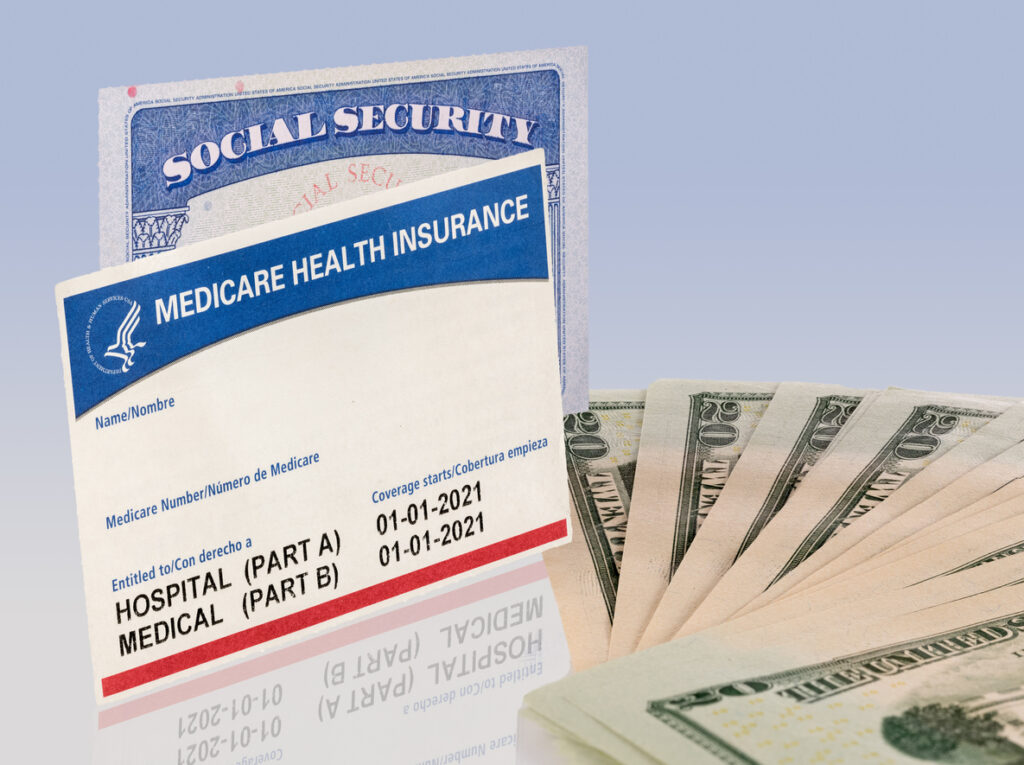 USA social security card with medicare and US dollars. Image credit: iStock