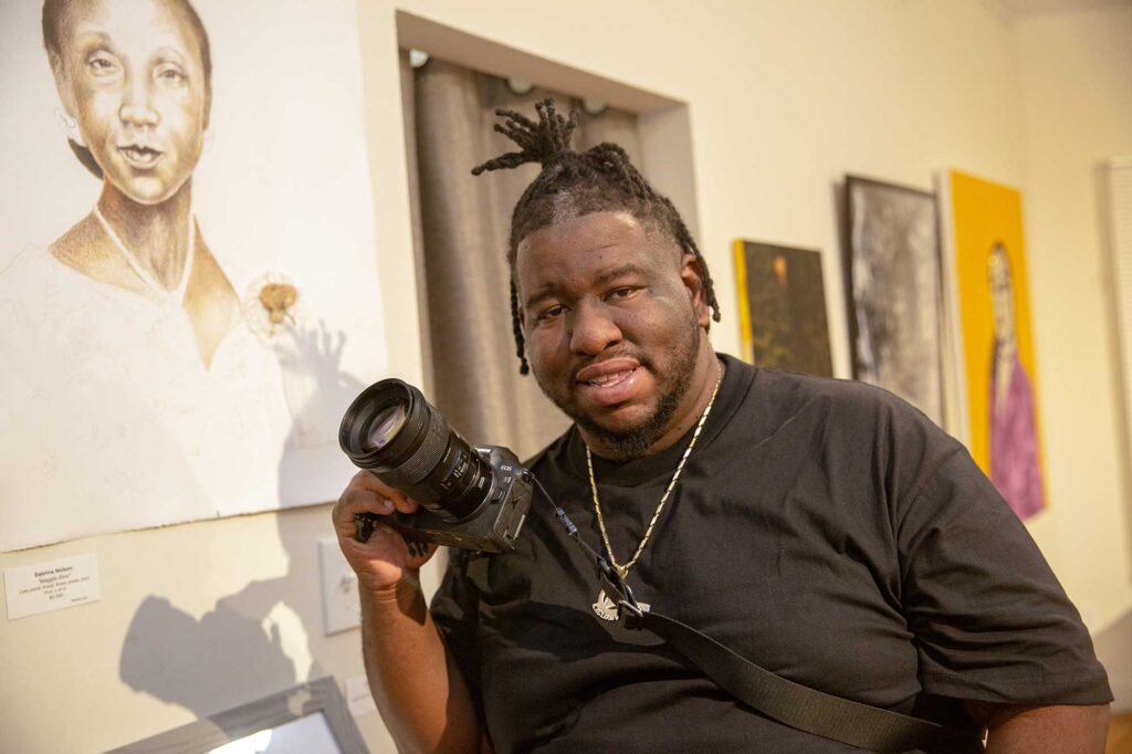 Stanley Larry, a professional photographer, was inspired to pick up a camera by Yvette Rock, a University of Michigan alumna and Detroit artist, through an art program. Image credit: Rebecca Cook, Michigan Photography.
