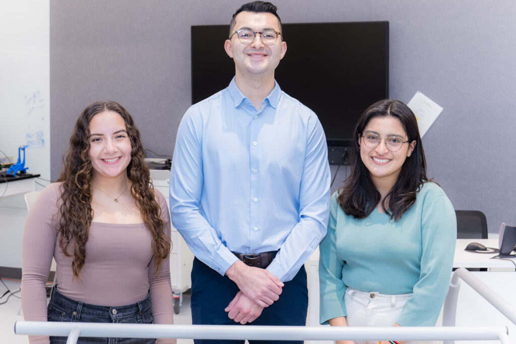 UROP mentor Steven Garcia middle with students Isabella Balza left and Jovanna Gallegos. Image credit: Sean Carter