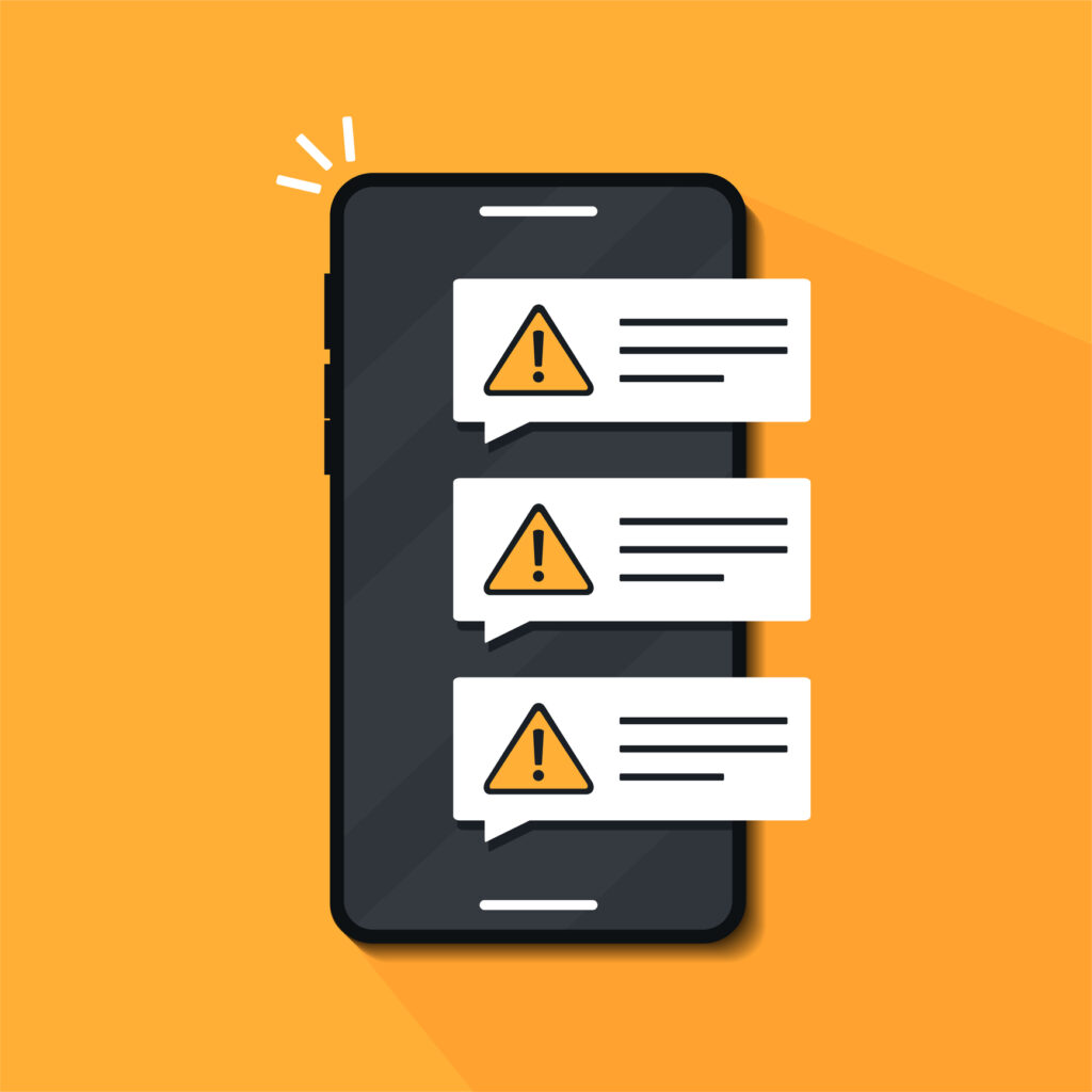 Smartphone with exclamation mark. Image credit: iStock