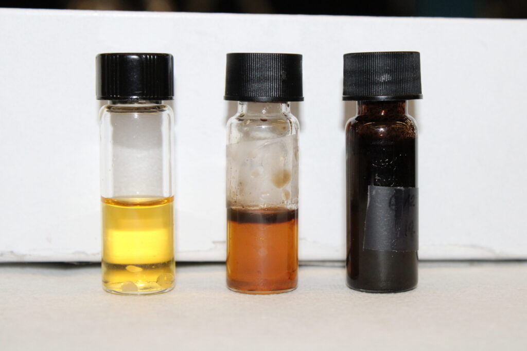 These small vials contain biocrude created from tests using different parts of potatoes. Initially, the team will run tests to create similar amounts of biocrude and other chemicals from Matthaei organic waste to determine how the biocrude and other products vary with the types of organic waste collected. Image credit: Derek Smith, PhD