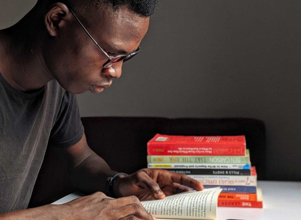 A man reading a book. Image credit: Oladimeji Ajegbile, Pexels.com