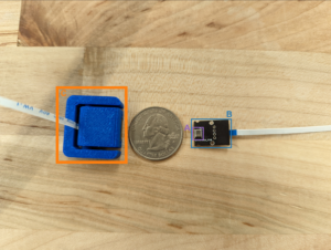 Voice PickUp units (VPUs) power SAWSense. Adapted from bone-conduction microphones, the small sensors (outlined in orange in this photo) are able to detect and record any event happening on a surface with a high amount of detail.