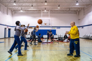 Ronald Taylor, 83, right, participates in the weekly Parkinson's exercise class. Image credit: Eric Bronson, Michigan Photography