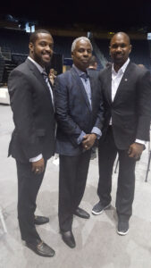 Greg Harden (center) is flanked by Olympian Jeff Porter and broadcaster Charles Woodson.