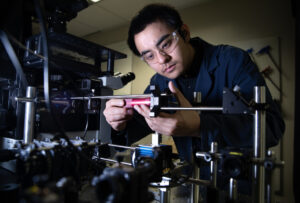 Gary Guangjie Cui, Ph.D. student at Electrical & Computer Engineering works in the Bioplasmonics Group lab at University of Michigan’s North Campus Research Complex. Image credit: Marcin Szczepanski/Lead Multimedia Storyteller, Michigan Engineering