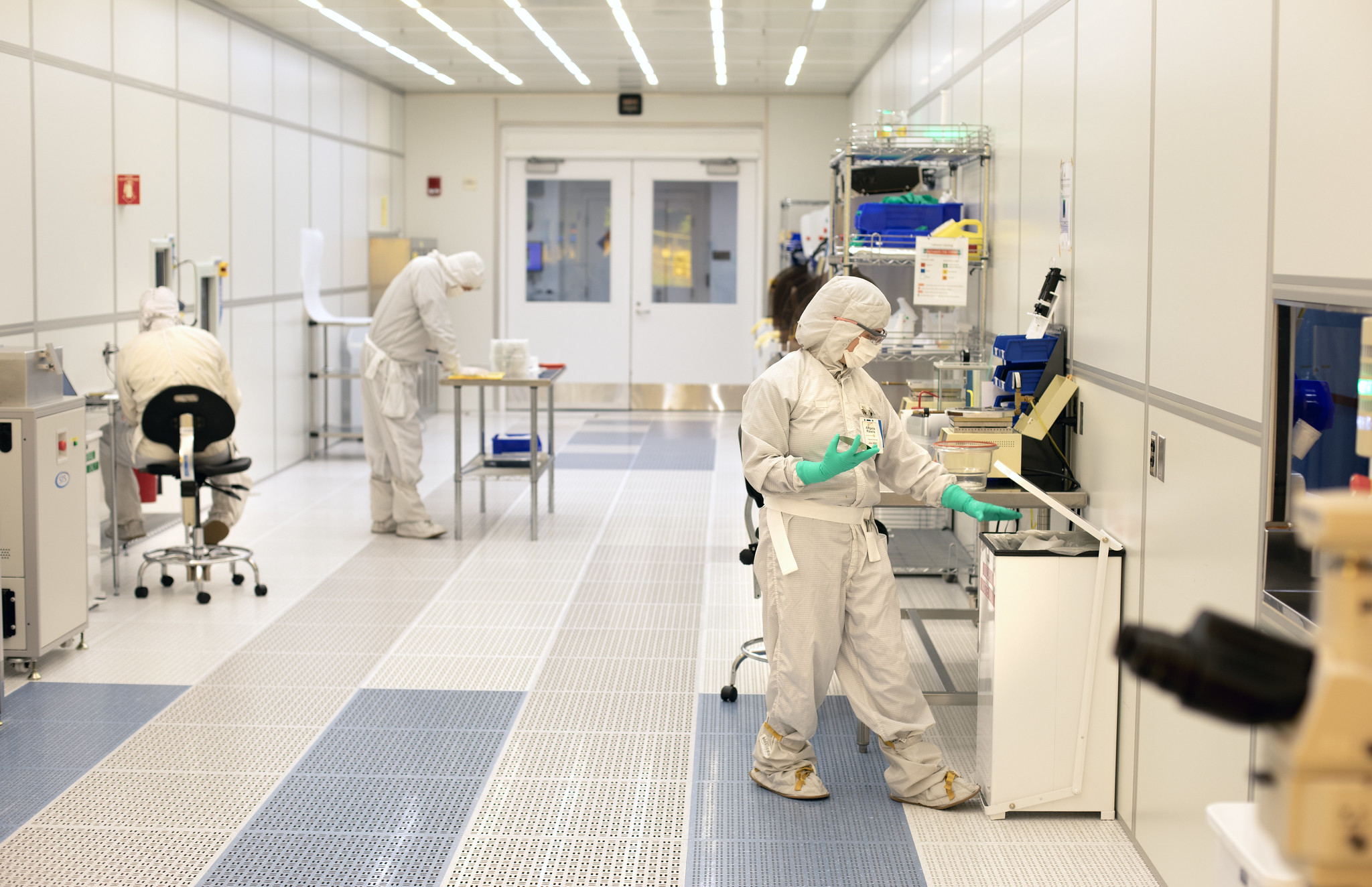 Researchers work at the University of Michigan Lurie Nanofabrication Facility. Image credit: Marcin Szczepanski, Michigan Engineering
