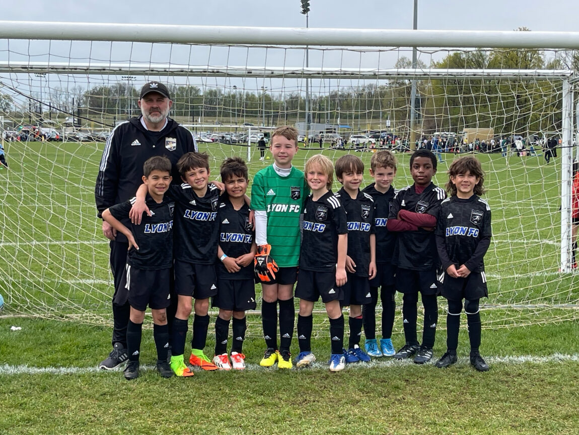 Trevor Kilgore, a student affairs engagement coordinator and academic adviser in the School of Kinesiology, is coaching four youth soccer teams this fall. (Photo by Tiffany Lawrie)