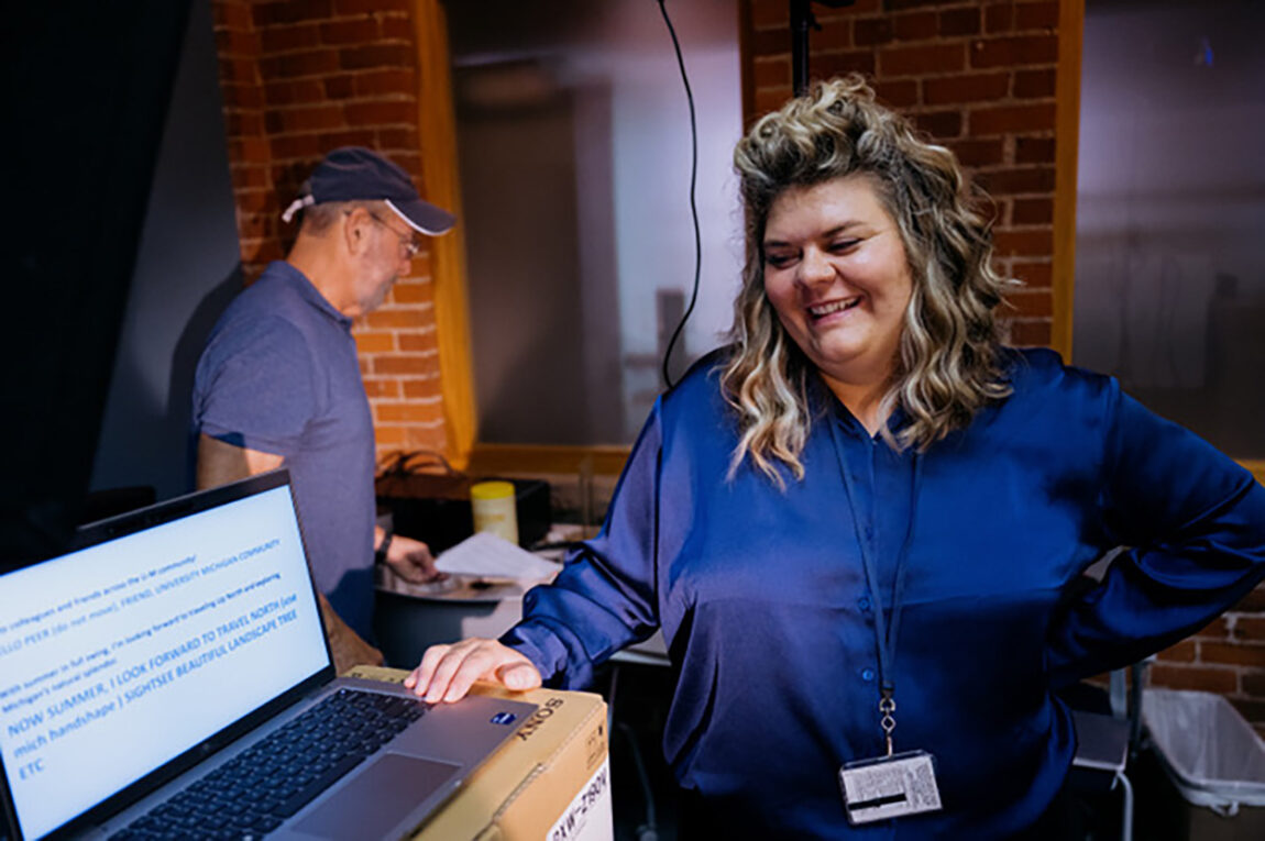 Photo of American Sign Language interpreter Casie Watson showing digital cue cards that are used in the process of providing sign language interpretation for President Santa J. Ono’s June video message.