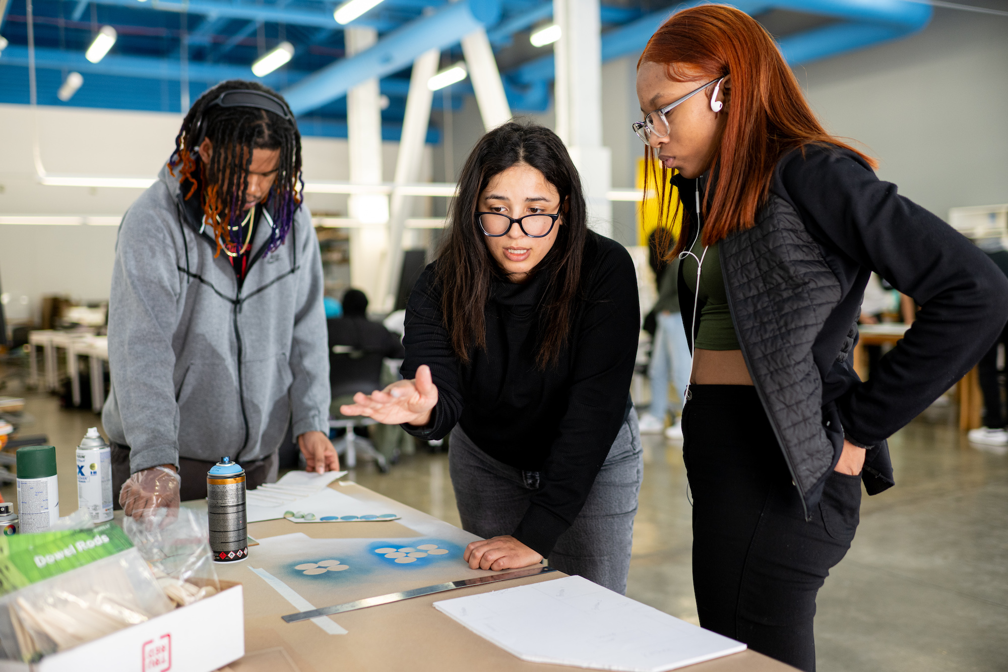 ArcPrep co-director Salam Rida, center, works with students at the Michigan Research Studio in Detroit. Image credit: Eric Bronson, Michigan Photography