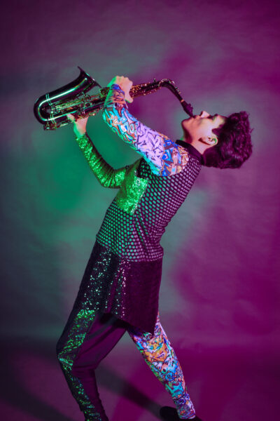 A photo of a person playing saxophone