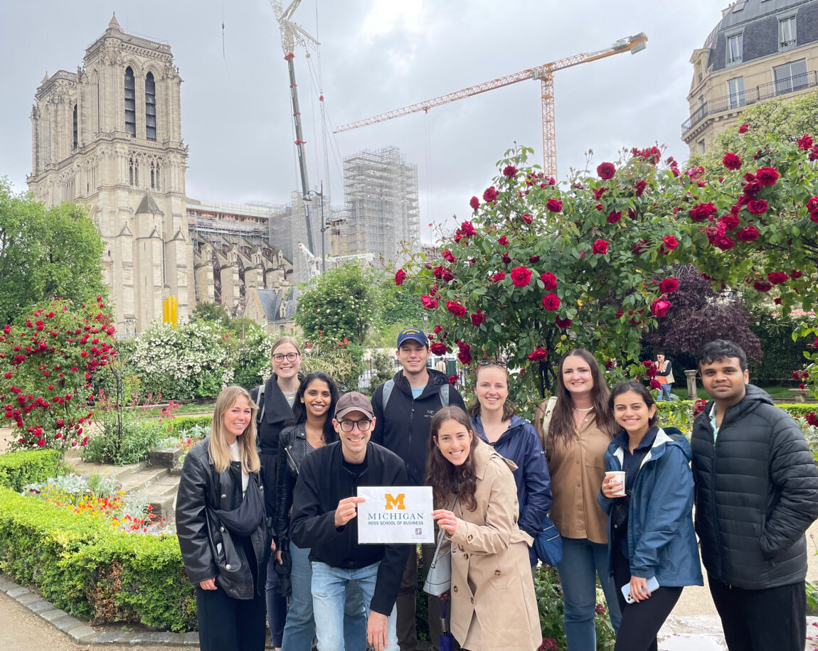 A photo of students in France in front of the Notre Dame Cathedral in Paris, France.