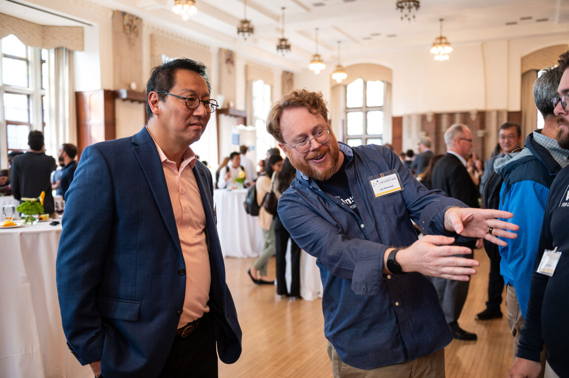 A photo of Jay Semerad talking with President Santa J. Ono at the Celebrate Invention reception.
