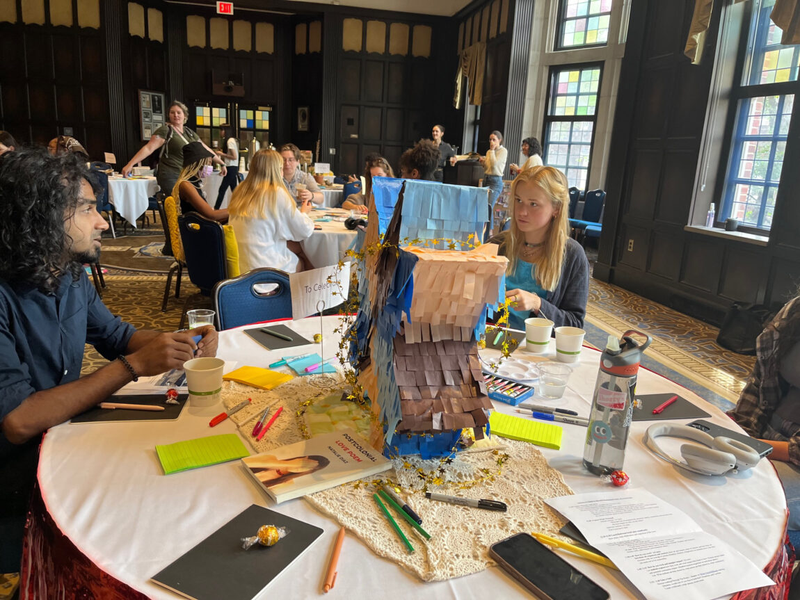 A photo of student artists at a kickoff event