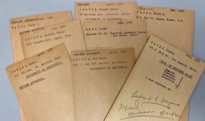 Tan cards with typing on them.