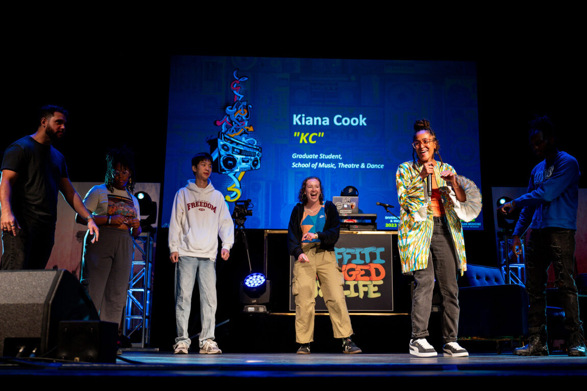 Kiana "KC" Cook (foreground), a School of Music, Theater & Dance graduate student, was one of several students who performd during a hip-hop cypher at the community assembly