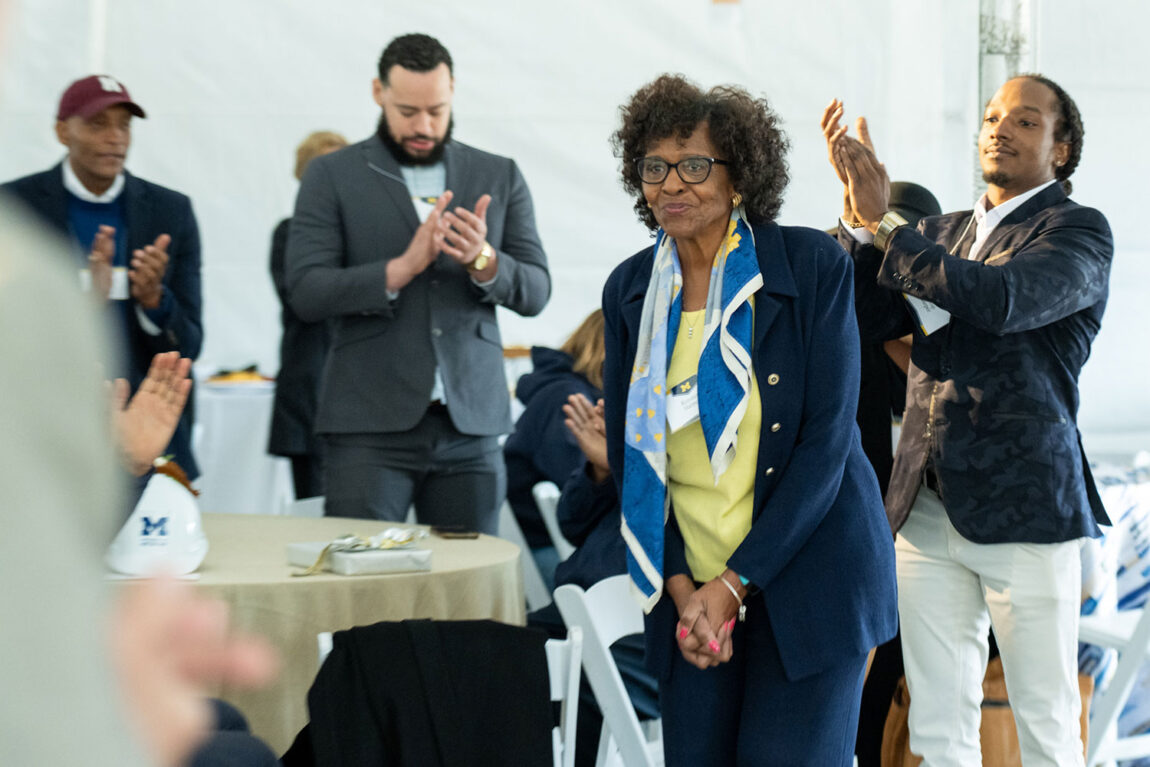 Photo of E. Royster Harper, vice president emerita for student life, being recognized and applauded at the groundbreaking ceremony.