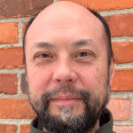 Headshot of Timothy Y. James