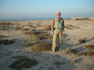 University of Michigan paleontologist Bill Sanders stands in the ancient pathway of a herd of elephants who trekked across the site of Mleisa in Abu Dhabi (U.A.E.) sometime between 8 and 7 million years ago. Image courtesy: Bill Sanders