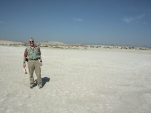 University of Michigan paleontologist Bill Sanders stands in the pathway of elephants who trekked the site of Mleisa in Abu Dhabi (U.A.E.) sometime between 8 and 7 million years ago. Image courtesy: Bill Sanders
