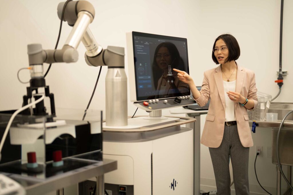 Zhen Xu, Professor of Biomedical Engineering, looks on as she explains a histotripsy treatment demonstration. Image credit: Erica Bass, Rogel Cancer Center, Michigan Medicine