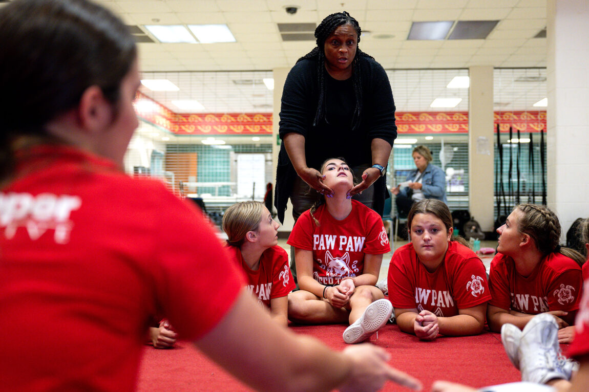 Stefanie Miller, Paw Paw High School math teacher and cheerleading coach, with cheerleaders