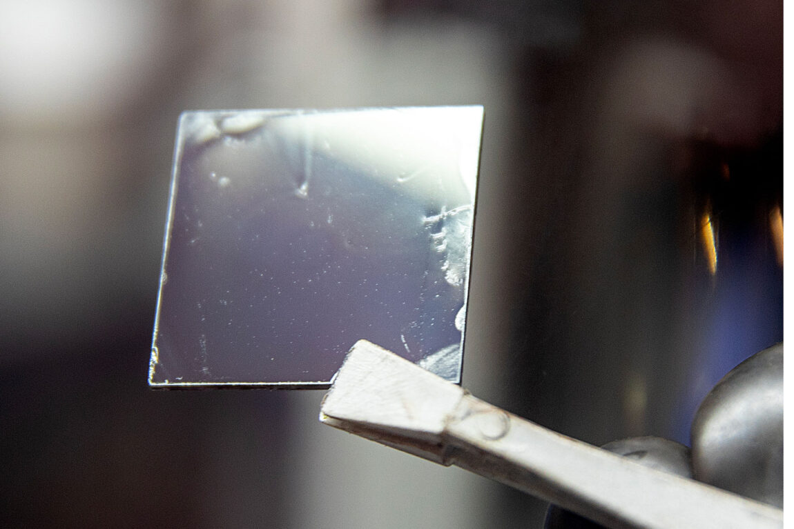 A photo of a layer of perovskite atop a semiconductor.