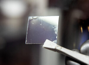 A layer of perovskite atop a semiconductor—a key step in the creation of perovskite solar cells. Image credit: Marcin Szczepanski/Lead Multimedia Storyteller, Michigan Engineering