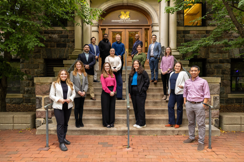 A 16-member University of Michigan student team will attend the two-week COP28 climate summit in Dubai, United Arab Emirates. Front row, left to right: Zoe Salamey, Shuhaid Nawawi. Second row: Sarah Phalen, Meredith Eaheart, Carmen Wagner, Ashley Martinez. Third row: Sebastian Lecha, Ally Stavros, Haley Neuenfeldt, Sarah Dieck Wells. Back row: Aaron Friedman-Heiman, Ananyo Bhattacharya, Ryan Revolinsky, Jacob Kennedy, Francisco Rentería. Image credit: Maddie Fox, U-M School for Environment and Sustainability.