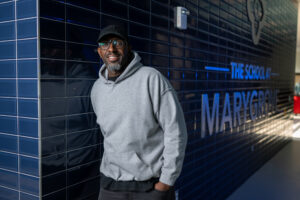 Tymon Ray, whose son Ryan Ray is on the robotics team at Marygrove, said he was really impressed with how Pryor made the team's culture a top priority. "It's teamwork. It's being on time. It's helping each other out…" Image credit: Eric Bronson, Michigan Photography