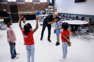 With literacy and life skill courses, the program uses a youth-centered approach that addresses the full life of the child that they believe can improve discipline, focus and self-esteem. Image credit: Erin Kirkland, Michigan Photography