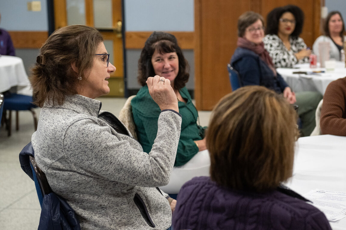 Photo of Gundy Sweet at the fall Provost's Seminar on Teaching making a point to the group during one of several concurrent sessions.