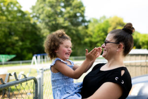 Tonia Miller plays with her niece. She also plans to continue her involvement with the Innocence Clinic by starting a letter-writing campaign to connect with those who are incarcerated for cases similar to hers. Image credit: Eric Bronson, Michigan Photography