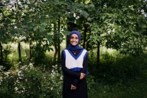 For student Ayaat Shiaab, the program's highlights included the bus tour around Detroit and the discussion panels, especially one that explored how the environment plays a major role in mental health. Image credit: Erin Kirkland, Michigan Photography