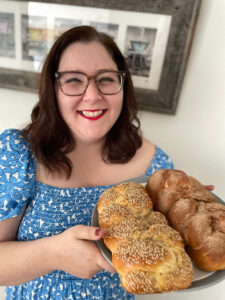 Wojcik displays freshly baked Challah.