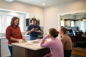 Tom and Amanda Irwin were living in Illinois with their daughters when his father passed. The family moved back to Michigan to work the farm and improve the brands and buildings. Image credit: Austin Thomason, Michigan Photography