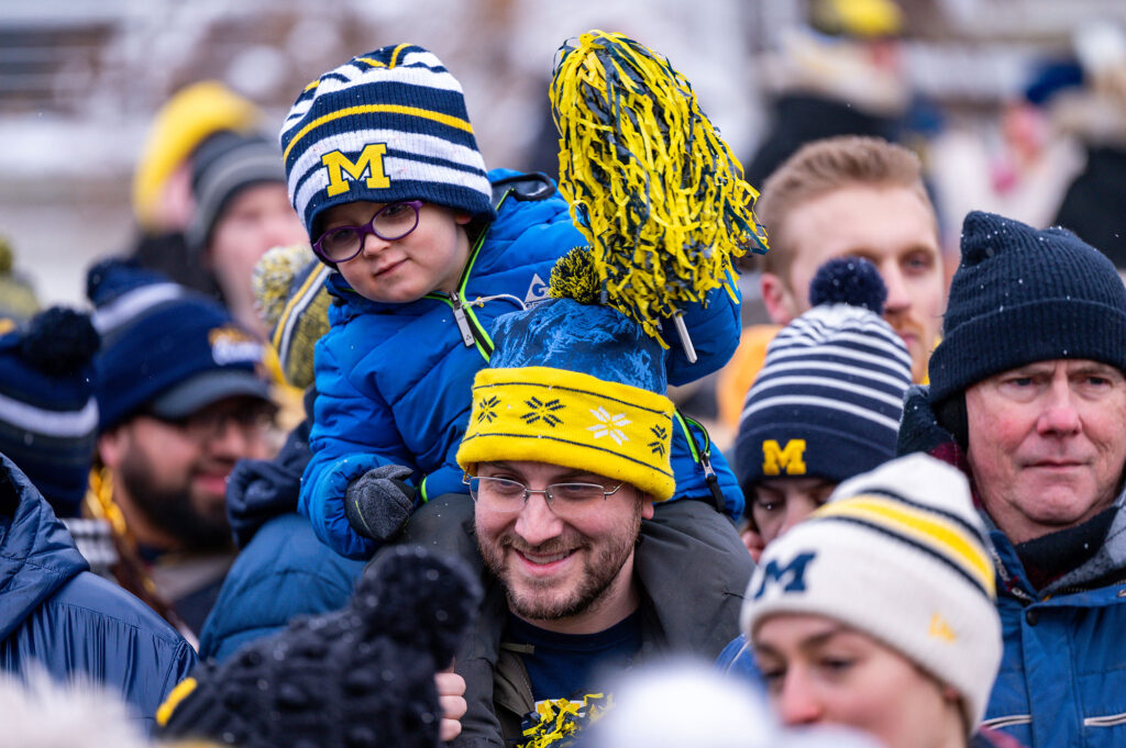 Fans young and old bundled up and cheered the team. 