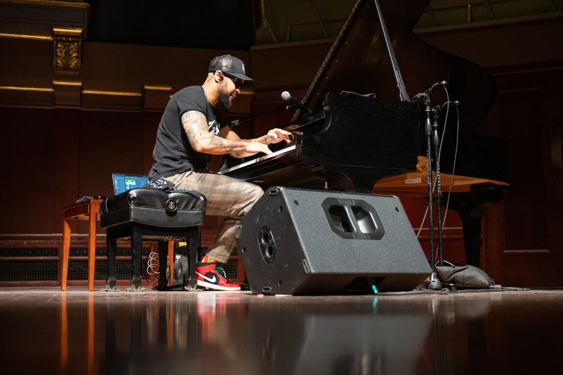 Photo of artist and composer BLKBOK performing at the keynote memorial event.