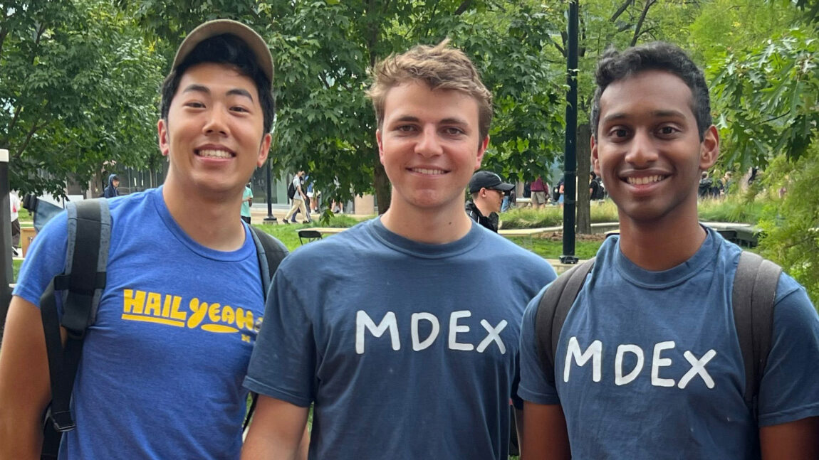 A photo of three U-M students who helped develop a mobile app called MDex.