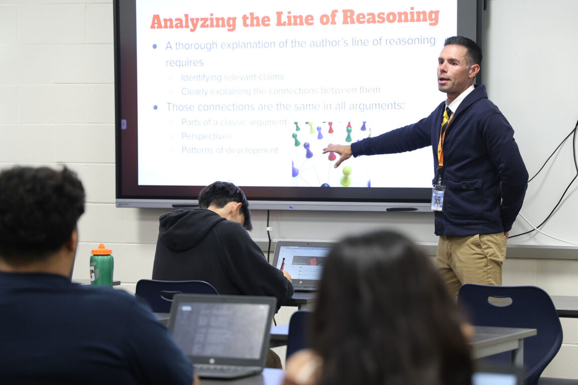 Photo of David Jimenez leading a high school class