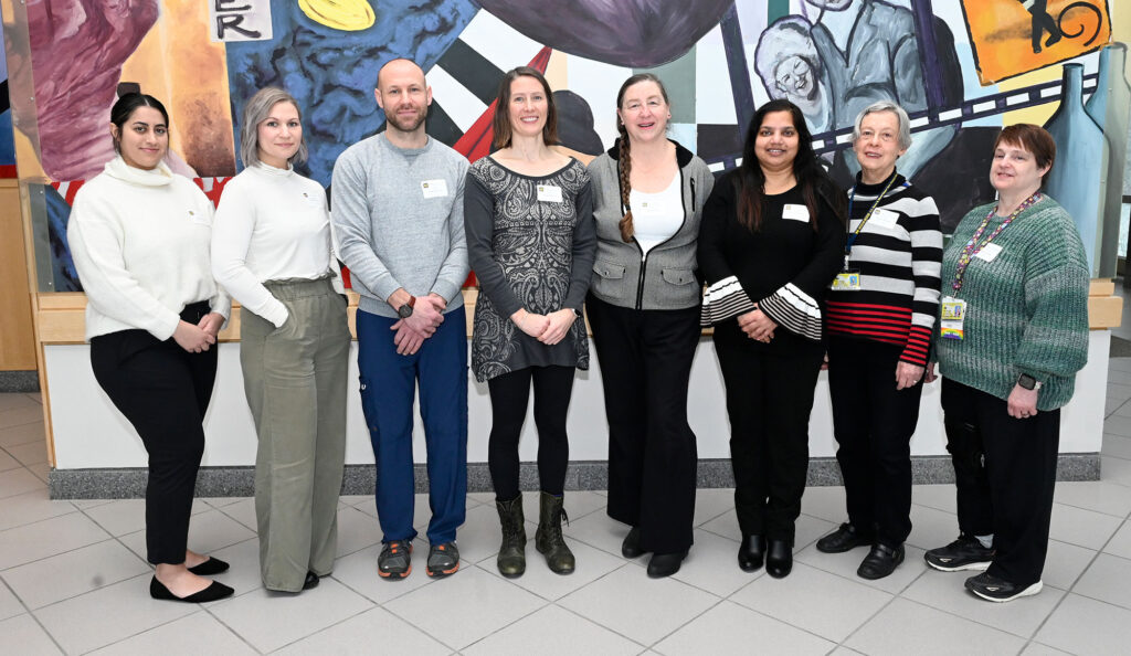 Inpatient Therapy (PT & OT) DEI Committee pictured L-R: Sabrina Ahmad, Clare Still, Matthew LaDue, Sophie Manning, Nancy Broadway, Gomati Kanphade, Barb Bernard Butler, Deanne Richmond received the U-M Distinguished Diversity Leaders Team Award in a ceremony held at Palmer Commons in Ann Arbor, Mich., Tuesday, Jan. 30, 2024. Not shown are Jill Gough and Ben Marr.