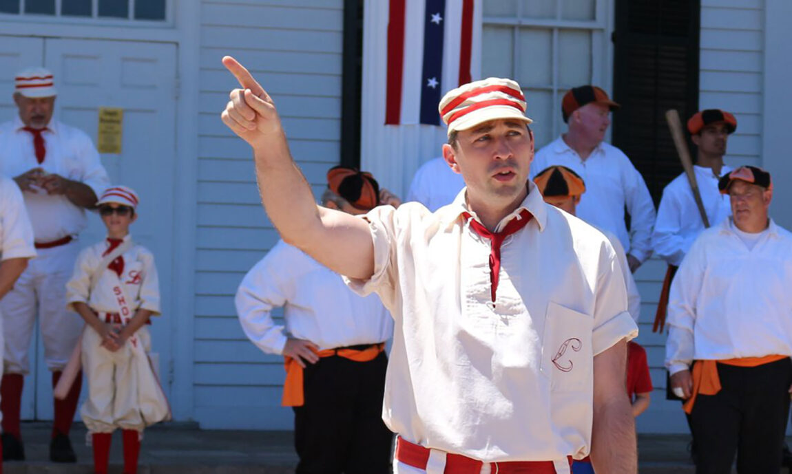 A photo of a man pointing