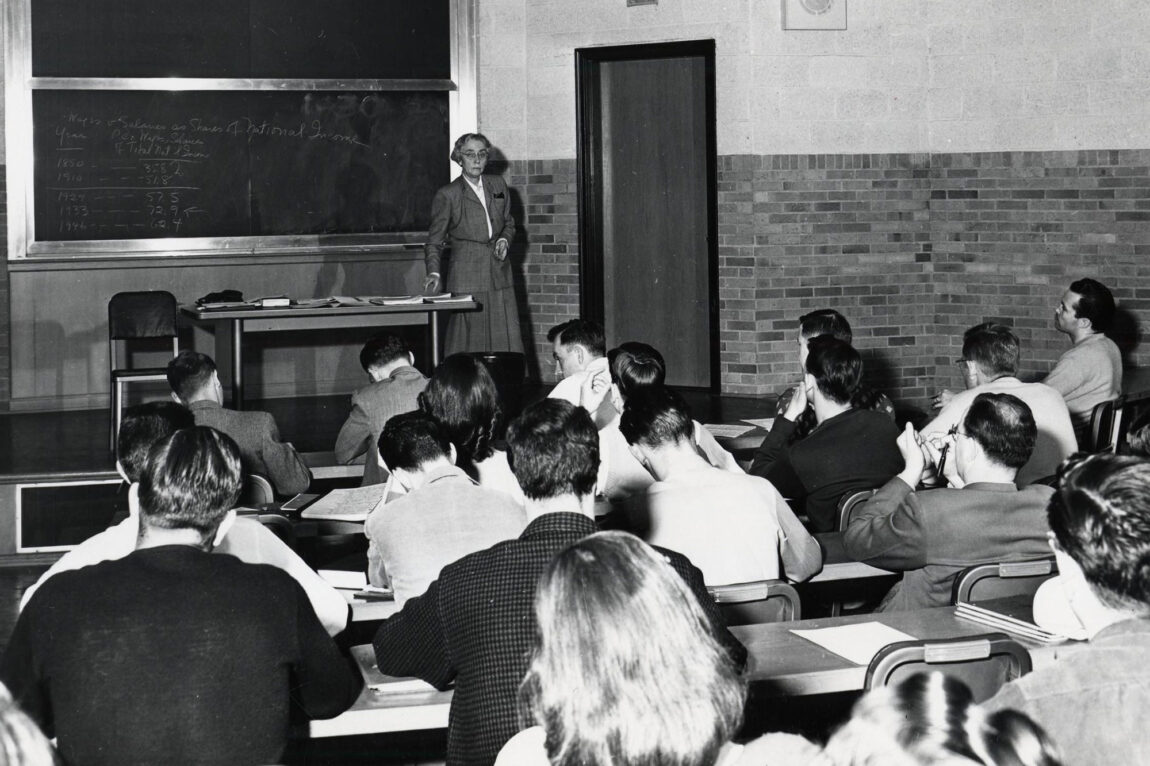 Photo of Margaret Elliott Tracy delivering a lecture in the early days of U-m's School of Business Administration.