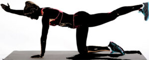 Person demonstrates bird dog stretch